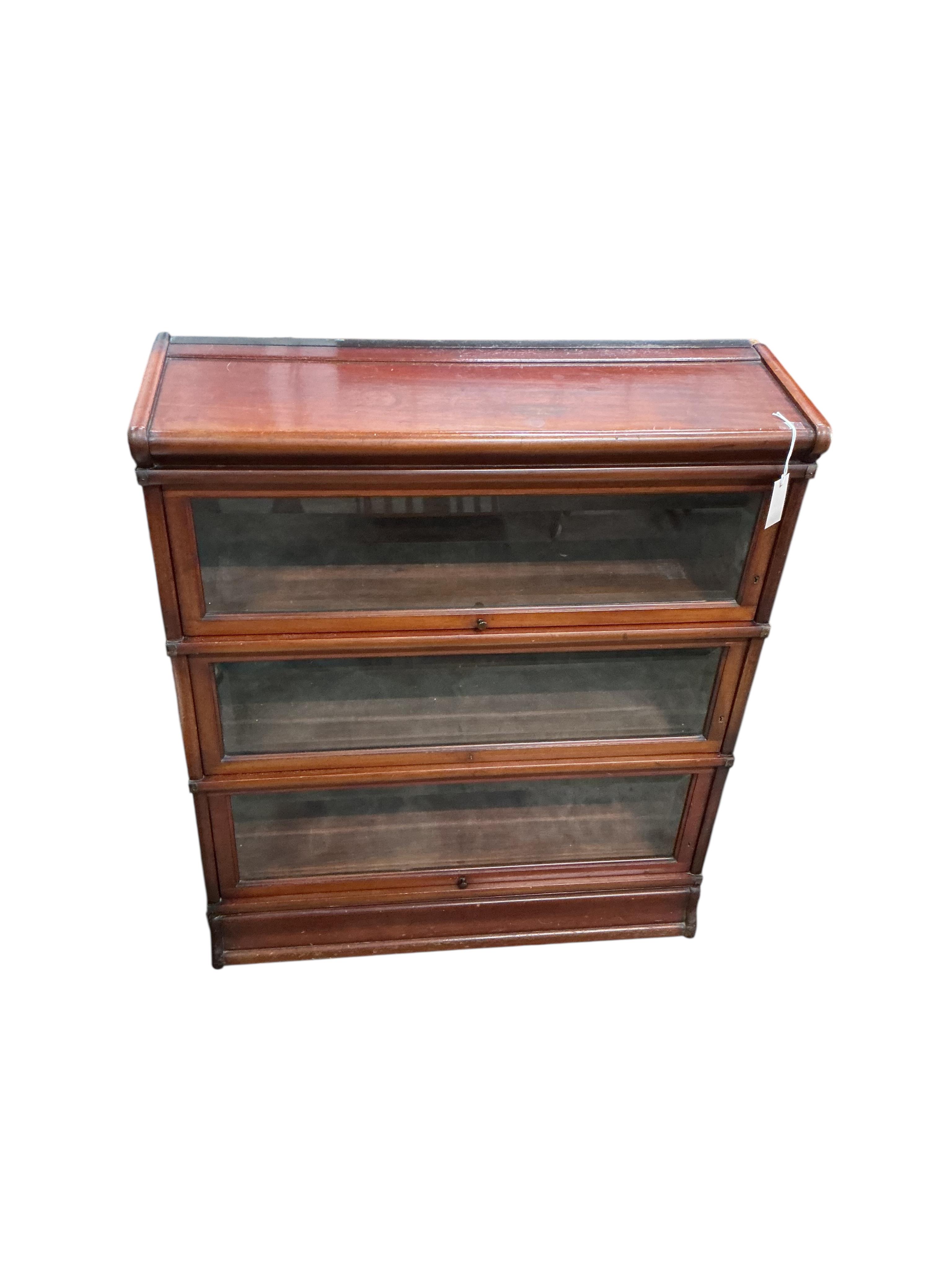 A Globe Wernicke mahogany three section bookcase, width 86cm, depth 29cm, height 102cm